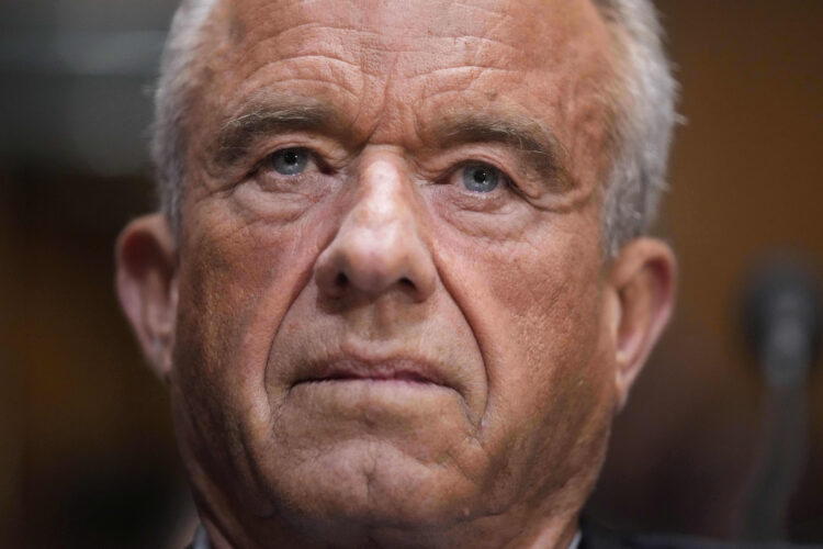 Kennedy tries to defend COVID-19 vaccine stance in raucous Senate hearing